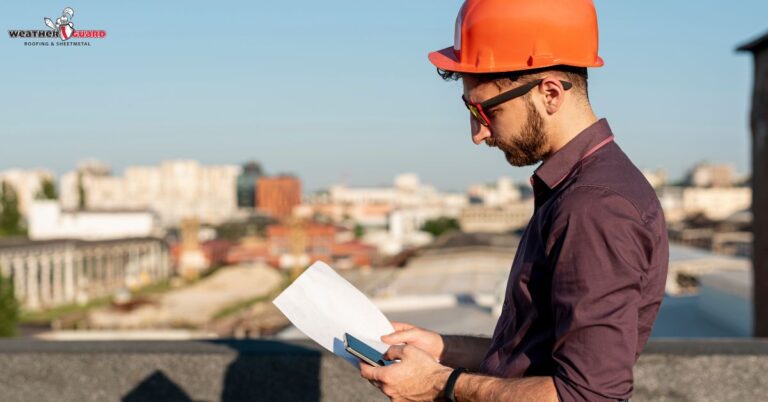 man finding ways to do after spotting a commercial roof leak